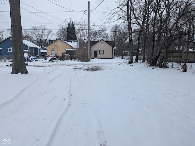 view of yard covered in snow