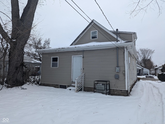 view of snow covered property