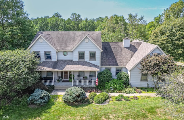 view of front of home with a front lawn and covered porch