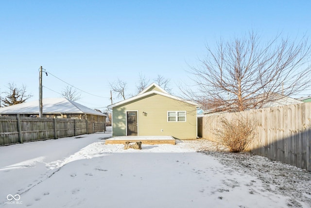 view of snow covered house