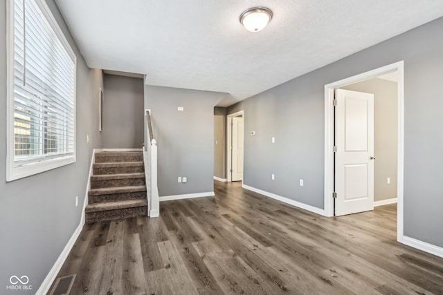 interior space with dark hardwood / wood-style floors