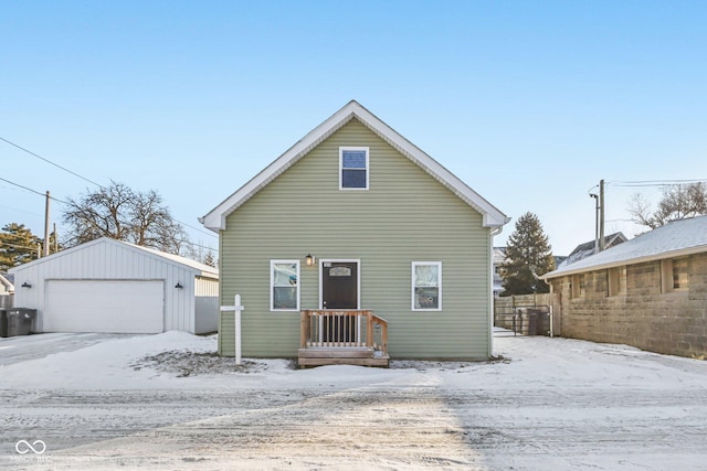 view of front of house featuring an outbuilding and a garage