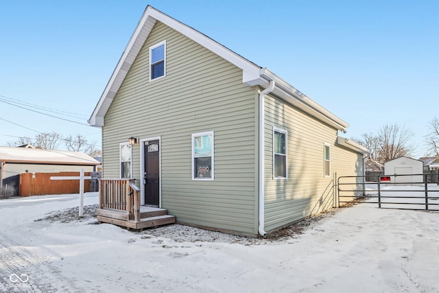 view of snow covered house