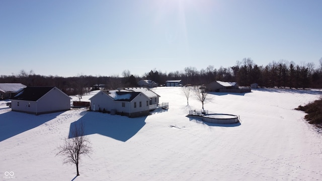 view of yard covered in snow