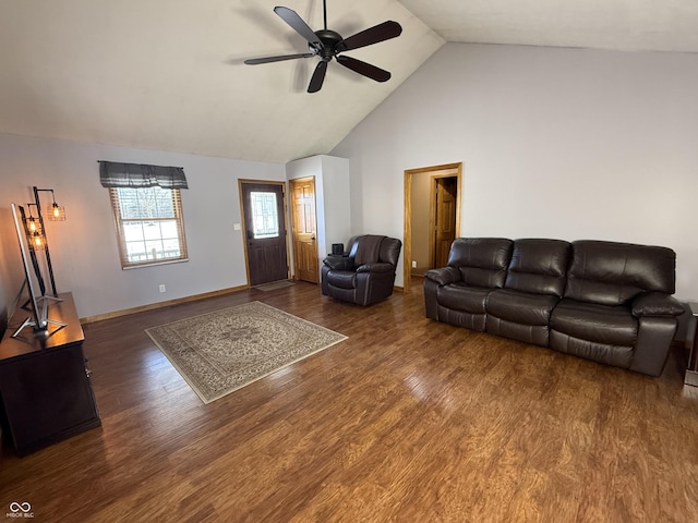 living room featuring ceiling fan, dark wood-type flooring, and high vaulted ceiling