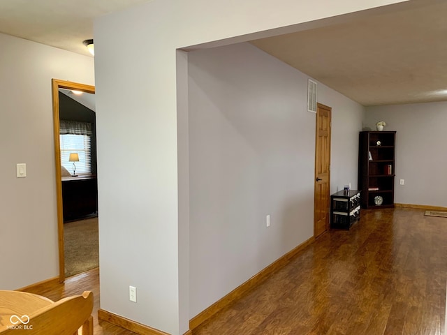 corridor featuring hardwood / wood-style flooring