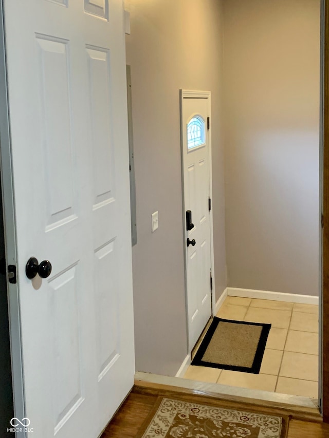 foyer featuring tile patterned floors