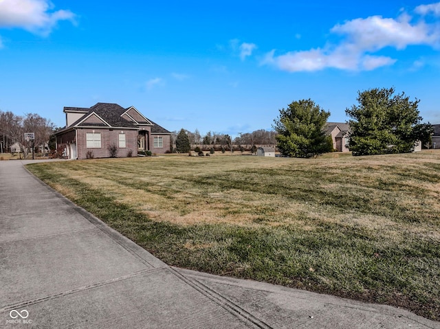 exterior space with a front yard