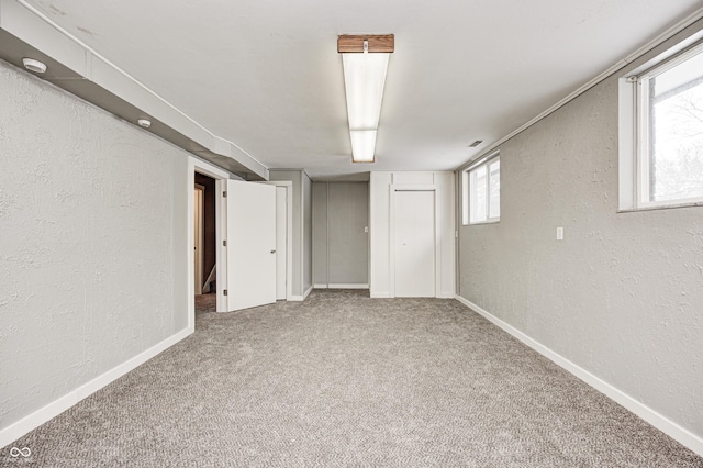 basement with carpet flooring