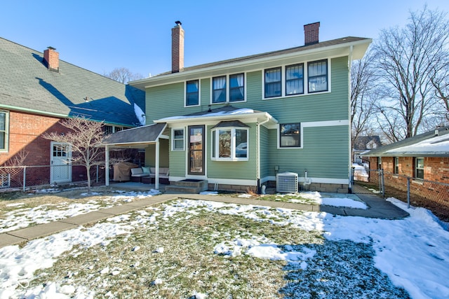 view of front of house featuring central AC