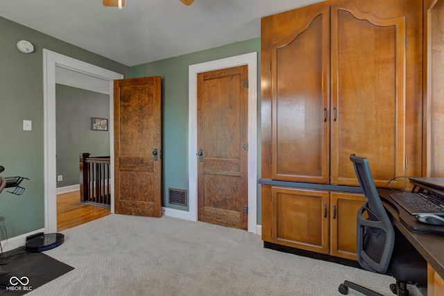 view of carpeted office space