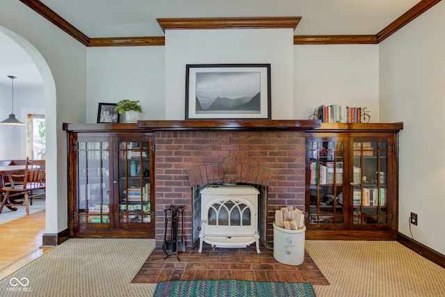 living room with carpet flooring, crown molding, and a wood stove