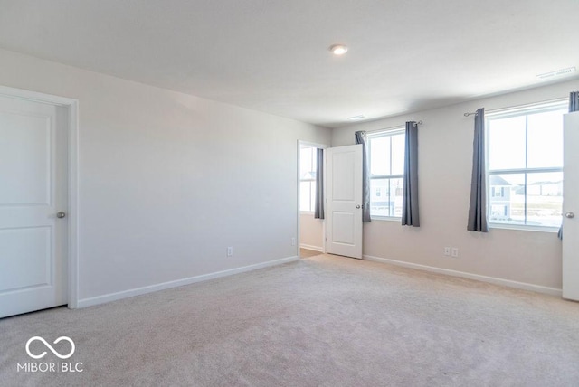 view of carpeted spare room