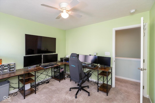 office featuring light colored carpet and ceiling fan