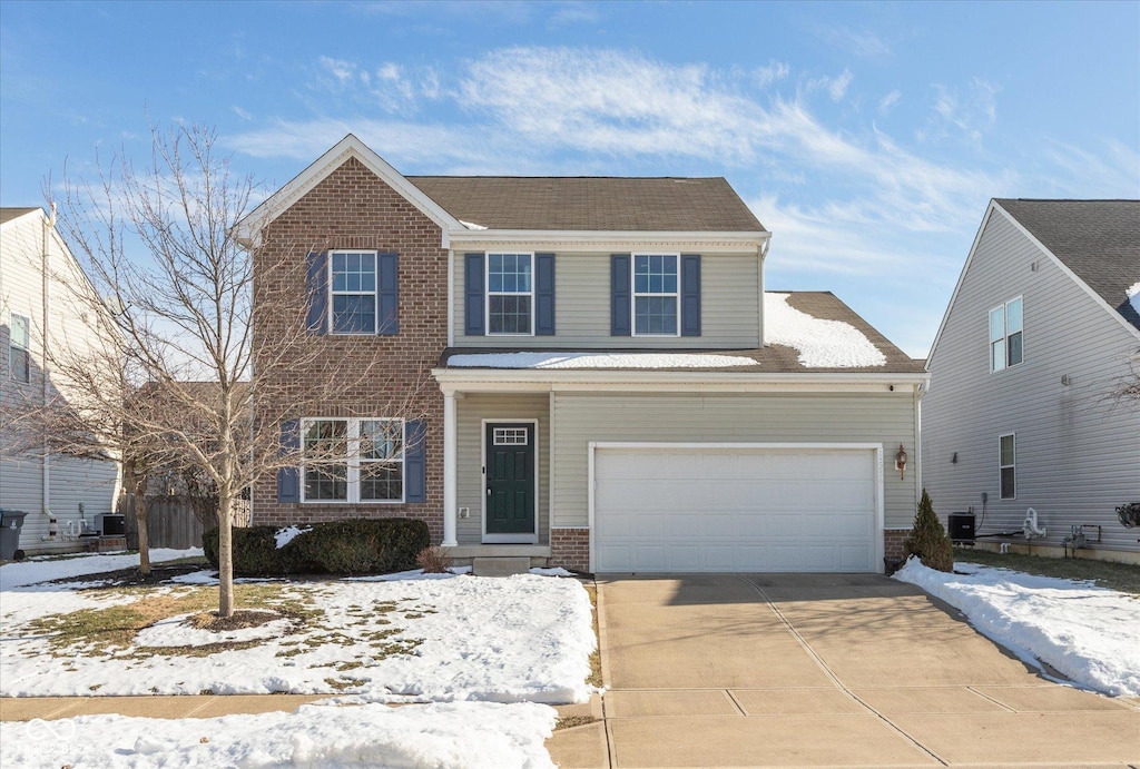 view of property with a garage