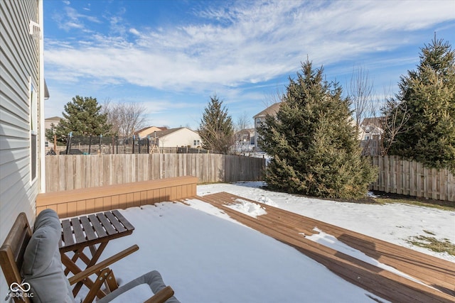 view of snow covered deck