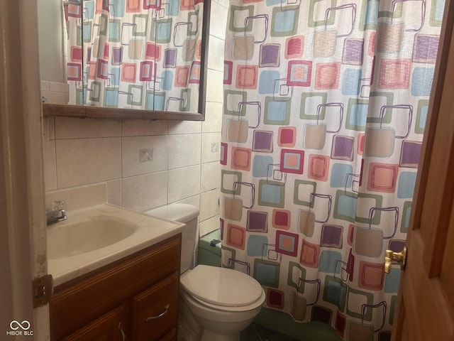 208 Winding Dr, Alexandria, IN 46001 - bathroom featuring tasteful backsplash, vanity, tile walls, toilet, and a shower with shower curtain