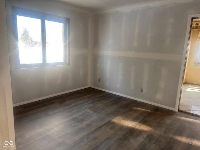 208 Winding Dr, Alexandria, IN 46001 - spare room featuring dark hardwood / wood-style floors
