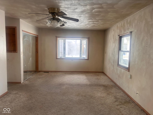 208 Winding Dr, Alexandria, IN 46001 - carpeted spare room with ceiling fan