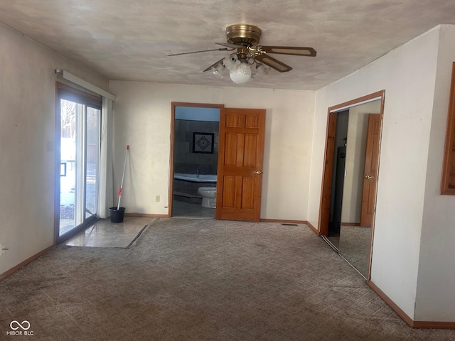 208 Winding Dr, Alexandria, IN 46001 - unfurnished living room featuring ceiling fan and light colored carpet