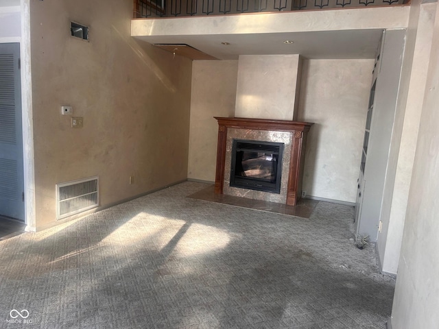 208 Winding Dr, Alexandria, IN 46001 - unfurnished living room with carpet floors and a premium fireplace