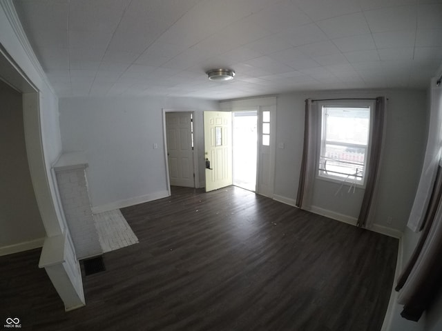 interior space with dark hardwood / wood-style flooring