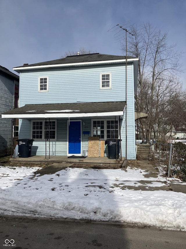 view of property featuring a porch