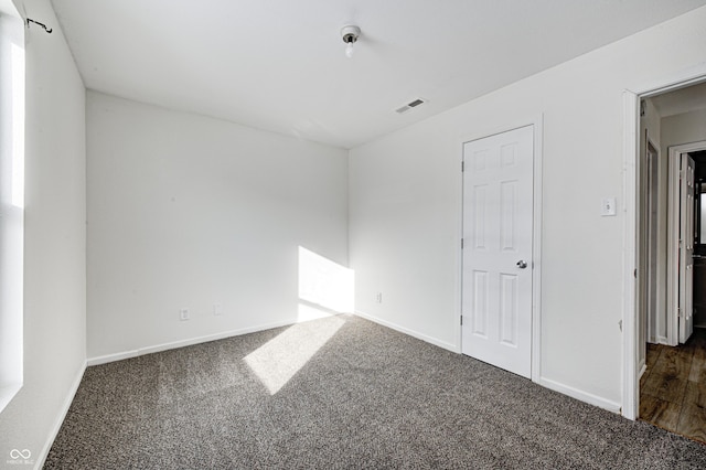 view of carpeted spare room