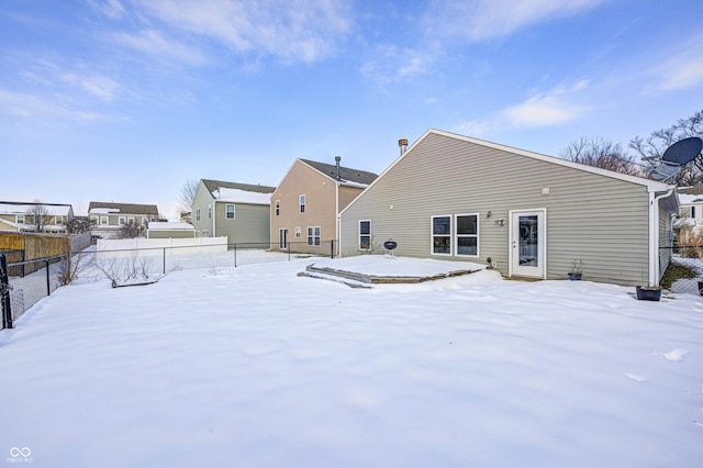 view of snow covered property