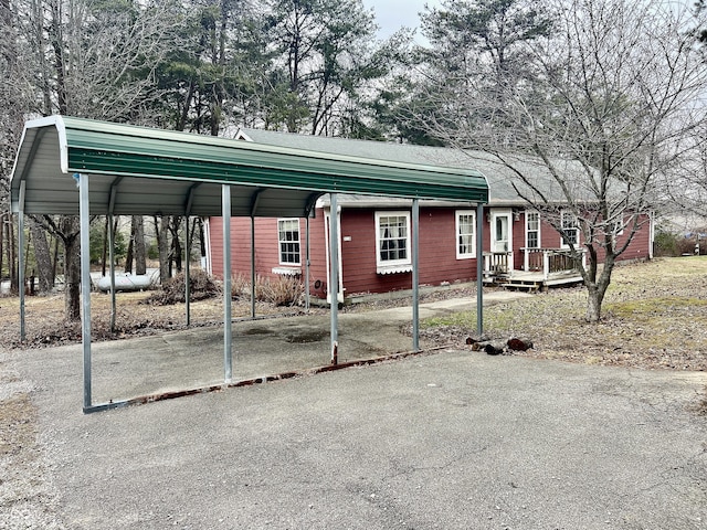 exterior space featuring a carport