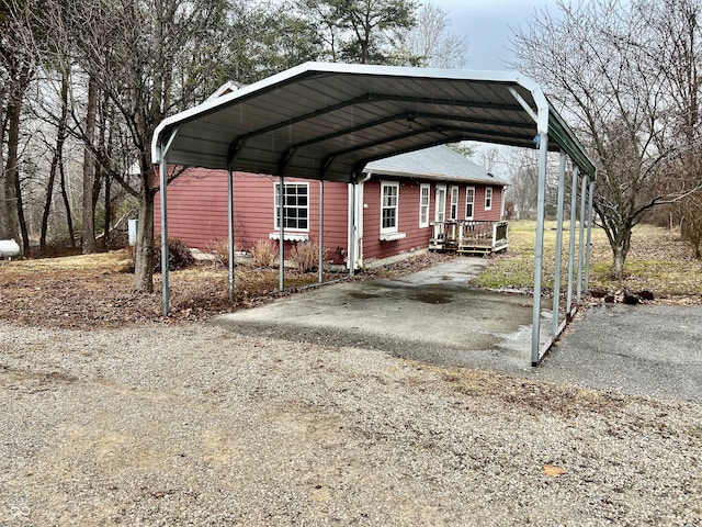 view of parking / parking lot with a carport