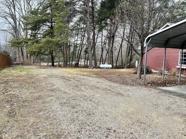 view of yard with a carport