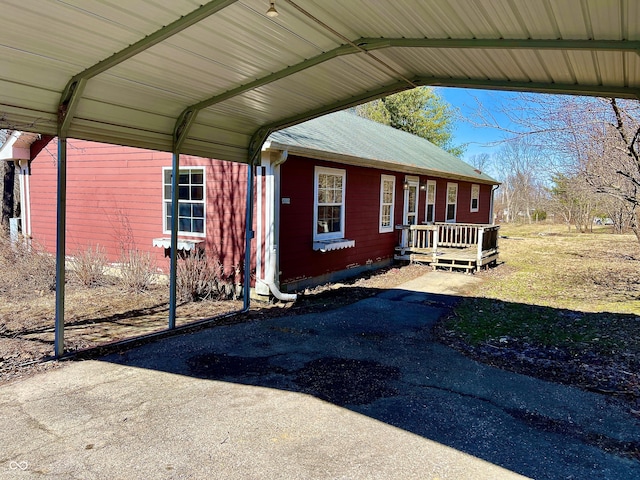 exterior space featuring a detached carport