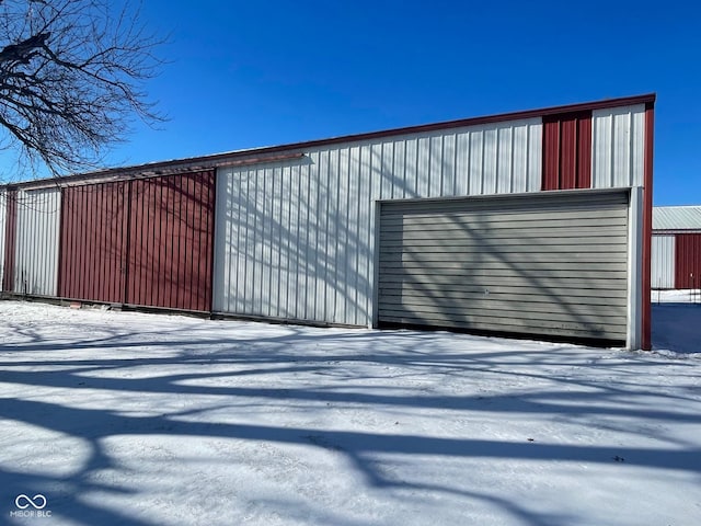 view of snow covered garage