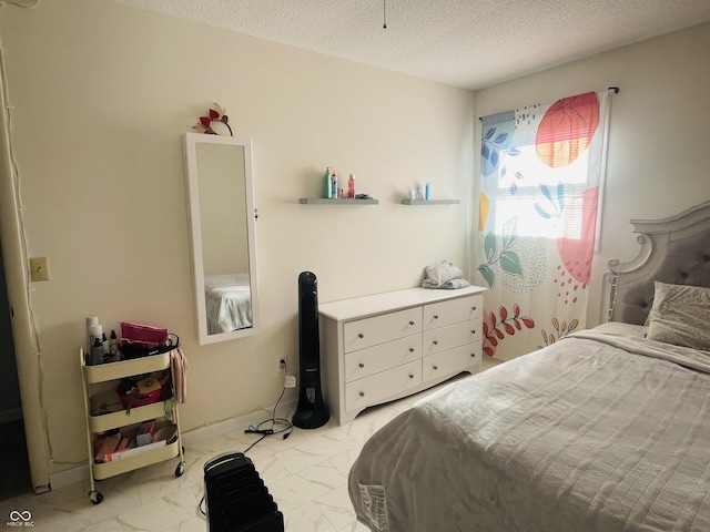 bedroom with a textured ceiling