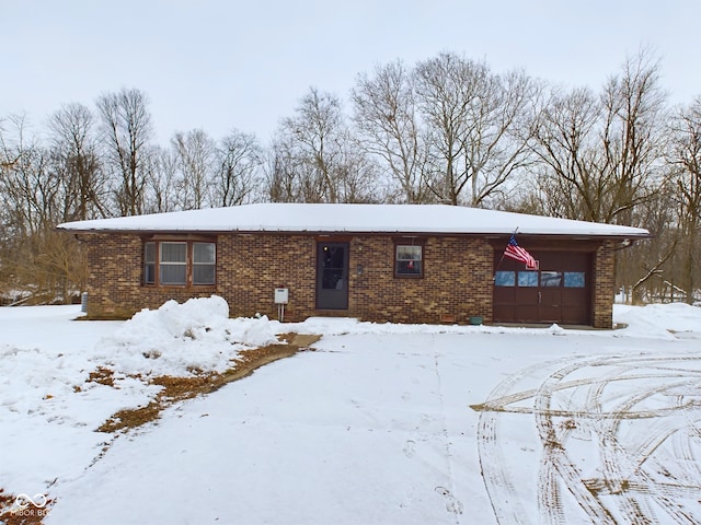 single story home featuring a garage