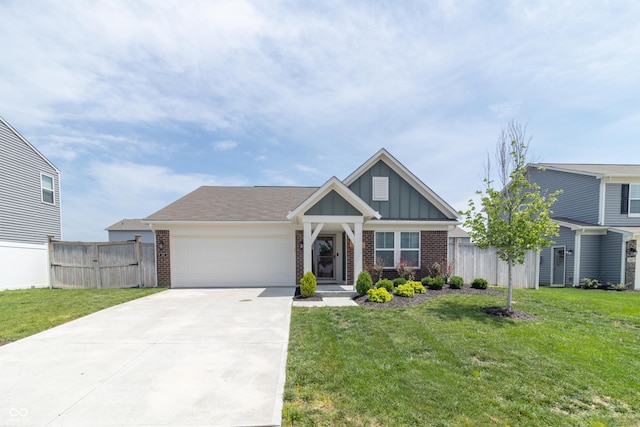 view of front of home featuring a garage and a front lawn