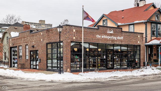 view of snow covered building