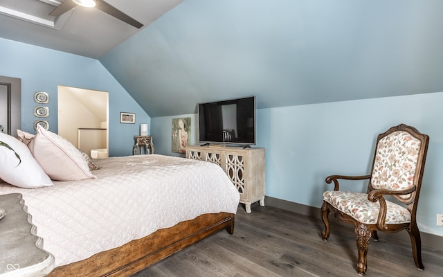 bedroom with ceiling fan, lofted ceiling, and hardwood / wood-style floors