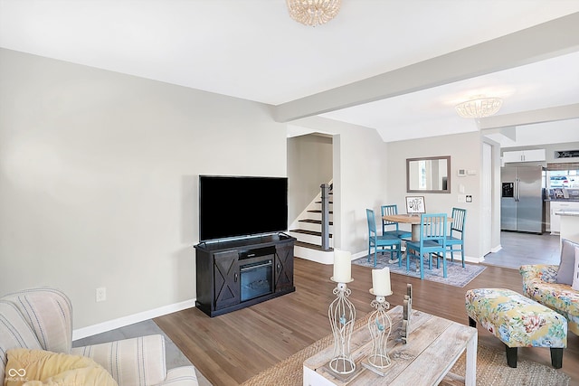 living room with dark hardwood / wood-style floors