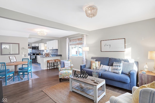 living room with dark wood-type flooring