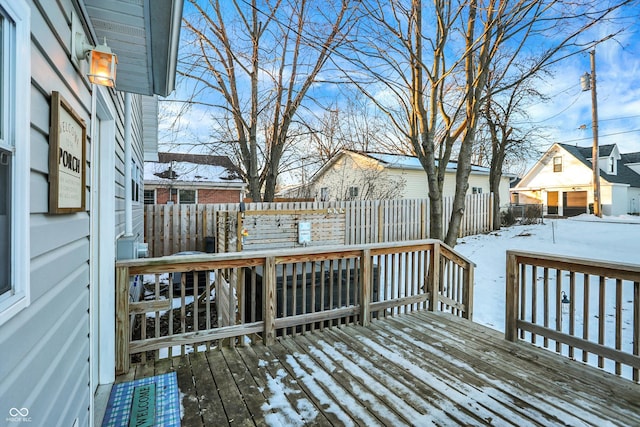 view of snow covered deck