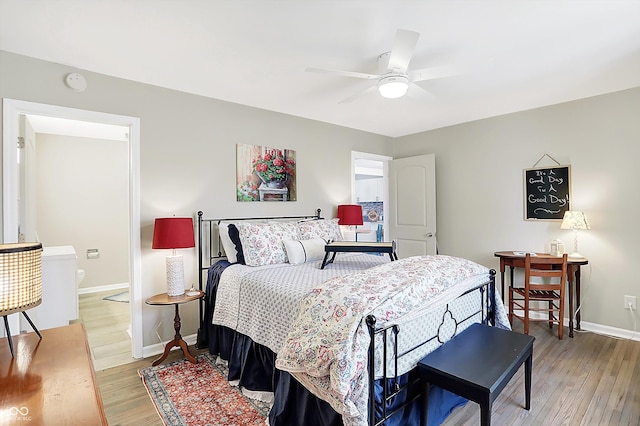 bedroom featuring ceiling fan and light wood-type flooring