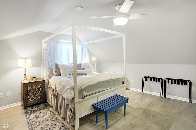 bedroom with ceiling fan and lofted ceiling