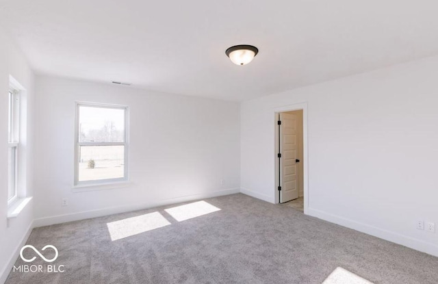 view of carpeted spare room