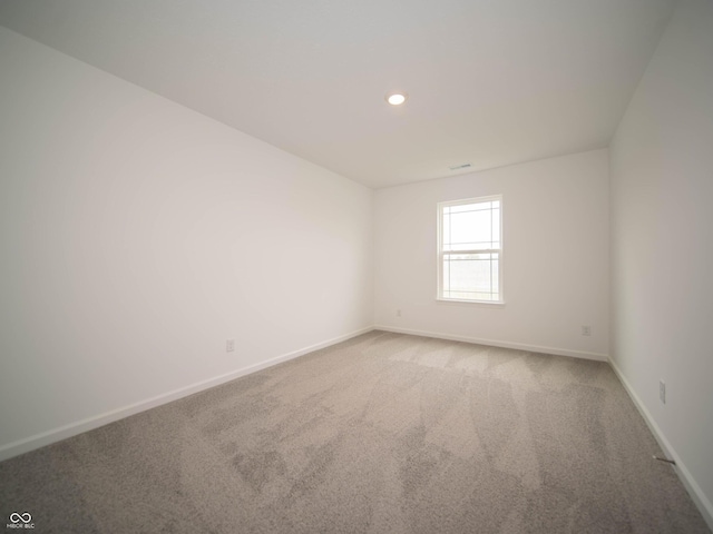 7824 Magnolia St, New Palestine, IN 46163 - spare room featuring light carpet and recessed lighting