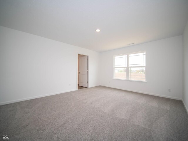 7824 Magnolia St, New Palestine, IN 46163 - carpeted spare room with baseboards and recessed lighting