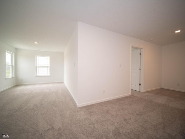 7824 Magnolia St, New Palestine, IN 46163 - carpeted spare room with baseboards and recessed lighting