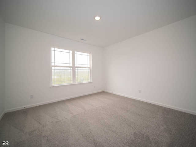 7824 Magnolia St, New Palestine, IN 46163 - carpeted spare room with baseboards and recessed lighting