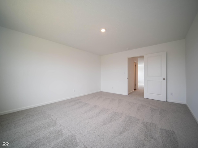 7824 Magnolia St, New Palestine, IN 46163 - carpeted spare room with baseboards and recessed lighting